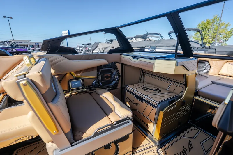 Slide: The Image of Luxurious interior of 2027 Tigé Ultré 25ZX boat with tan leather seating and modern design. - 53