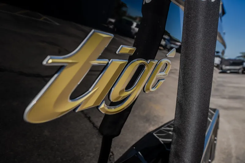 Slide: The Image of Close-up of Tigé logo on 2027 Ultré 25ZX boat. - 22
