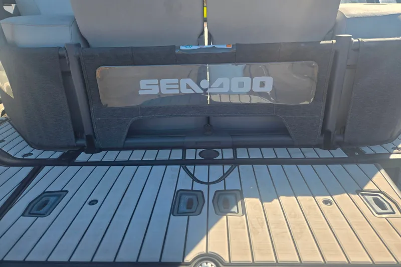 Slide: The Image of 2023 Sea-Doo Switch Cruise 21 rear deck with logo and seating. - 12