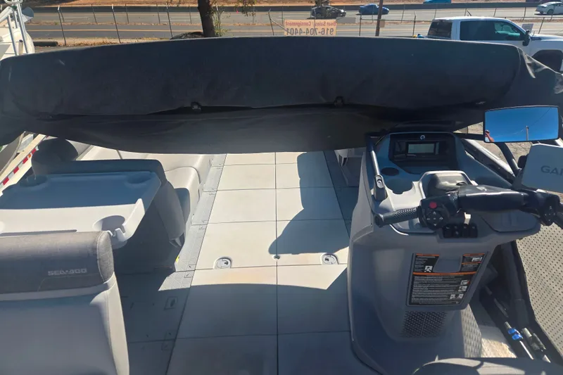 Slide: The Image of 2023 Sea-Doo Switch Cruise 21 interior with steering console and seating area. - 5