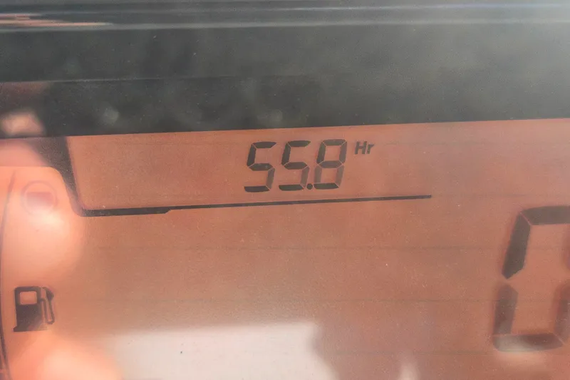 Slide: The Image of Dashboard display showing 55.8 hours on 2023 Sea-Doo Switch Cruise 21. - 10