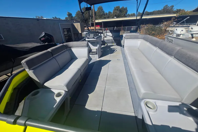 Slide: The Image of 2023 Sea-Doo Switch Cruise 21 pontoon boat interior with spacious seating and modern design. - 11