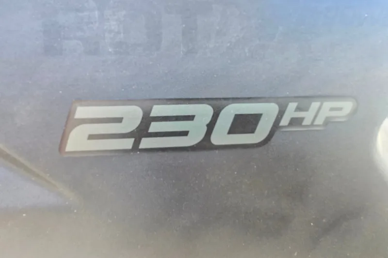 Slide: The Image of 230 HP badge on 2023 Sea-Doo Switch Cruise 21 boat. - 18