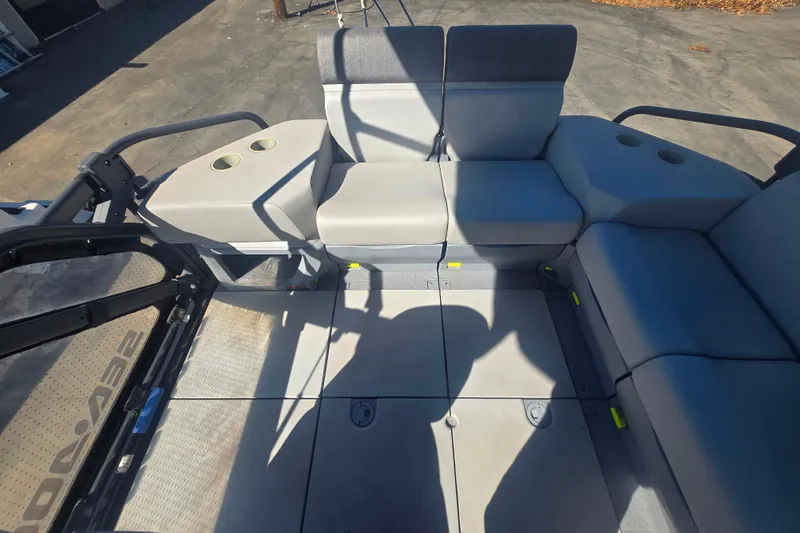 Slide: The Image of 2023 Sea-Doo Switch Cruise 21 interior seating with cup holders and modular design. - 19