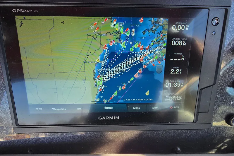 Slide: The Image of Garmin GPS display on 1992 Sea Ray 380 Sun Sport, showing Lake St. Clair navigation map. - 16