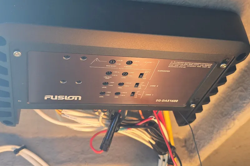 Slide: The Image of Fusion SG-DA51600 audio amplifier installed on a 1992 Sea Ray 380 Sun Sport boat. - 28