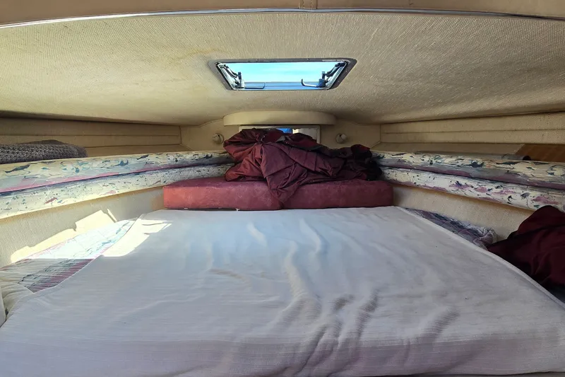 Slide: The Image of Interior cabin of 1992 Sea Ray 380 Sun Sport with bedding and skylight. - 20