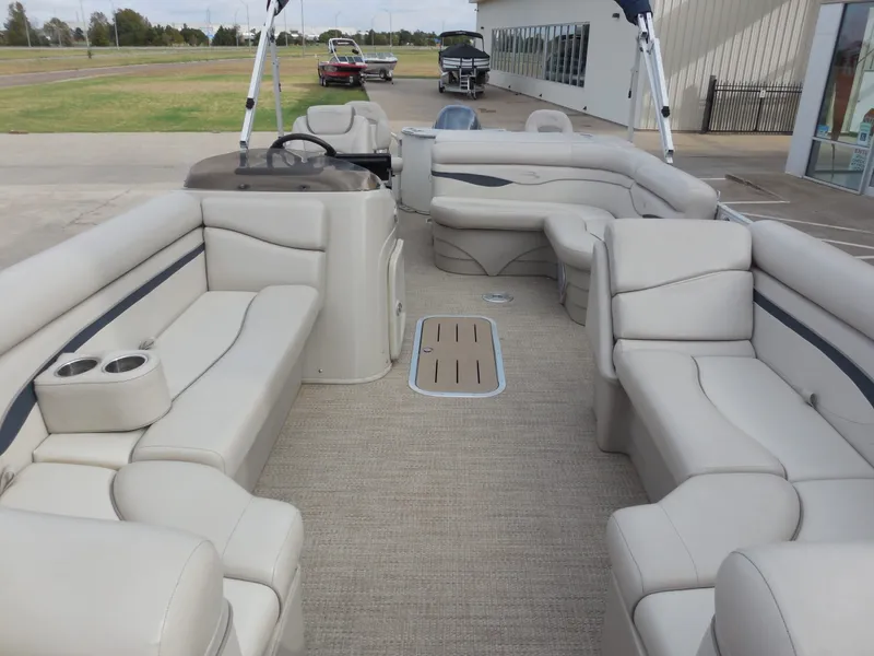 Slide: The Image of 2019 Bennington 22 SSx APG pontoon boat with spacious seating area and modern design. - 14
