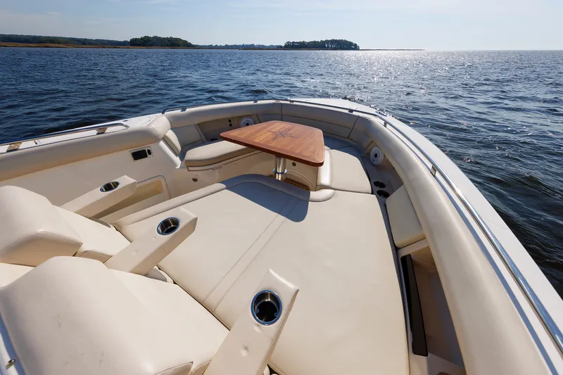 Slide: The Image of Luxurious seating area on 2020 Boston Whaler 380 Realm boat, with ocean view. - 60