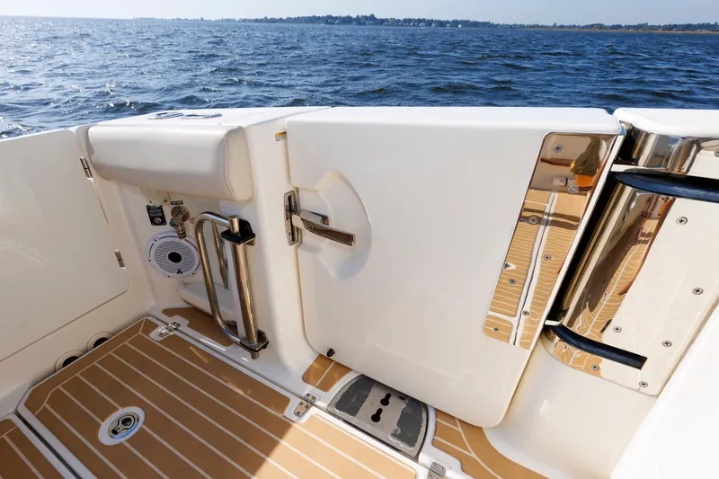 Slide: The Image of 2020 Boston Whaler 380 Realm boat deck with stainless steel fittings and ocean view. - 36