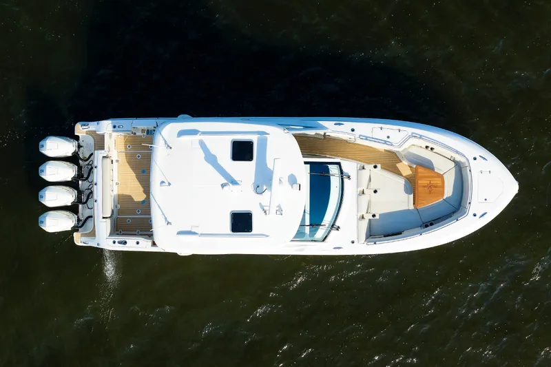 Slide: The Image of Aerial view of 2020 Boston Whaler 380 Realm boat on water. - 14