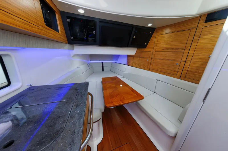 Slide: The Image of Luxurious interior of 2020 Boston Whaler 380 Realm with sleek wood finishes and modern seating. - 71