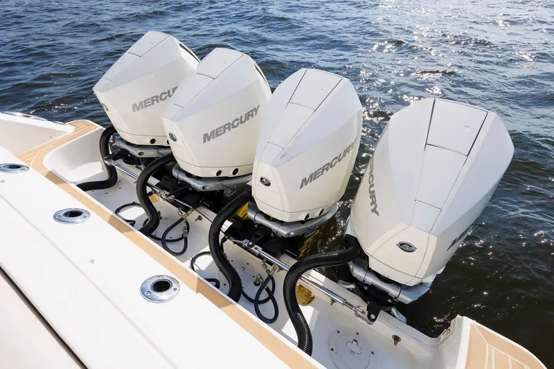 Slide: The Image of Four Mercury outboard engines on a 2020 Boston Whaler 380 Realm boat. - 29