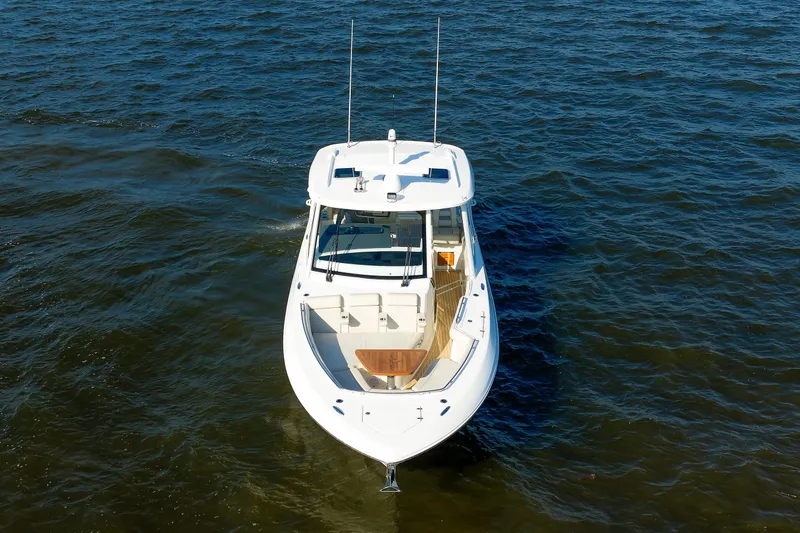 Slide: The Image of 2020 Boston Whaler 380 Realm boat on open water, aerial view. - 15