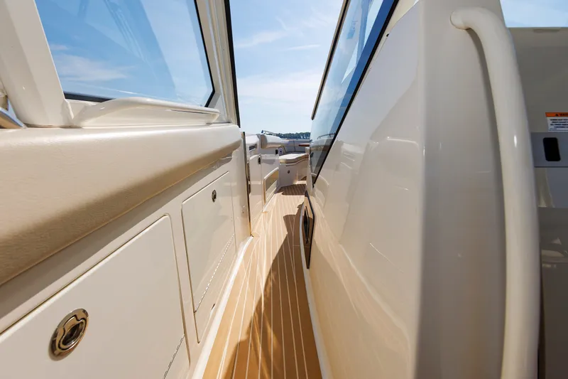 Slide: The Image of 2020 Boston Whaler 380 Realm boat deck with sleek design and modern features. - 57
