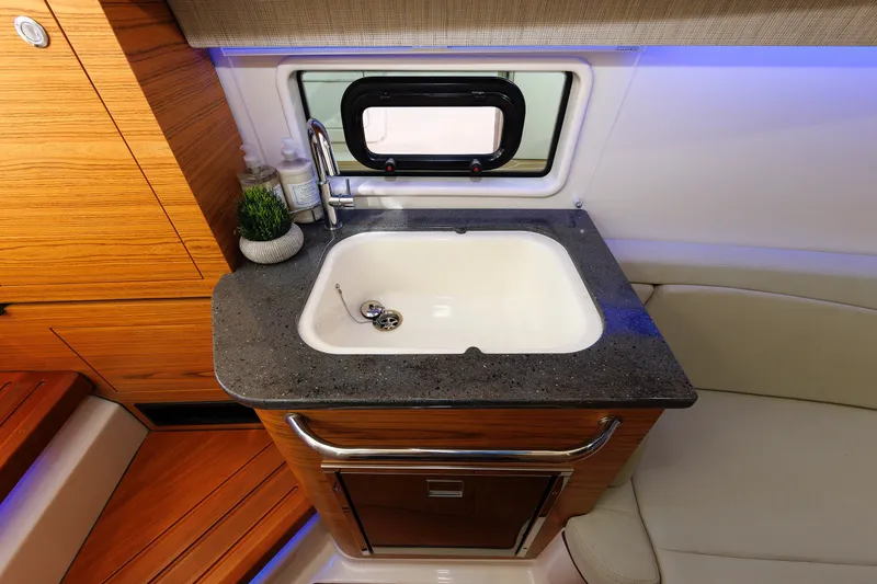 Slide: The Image of Luxury sink area in 2020 Boston Whaler 380 Realm boat interior. - 69
