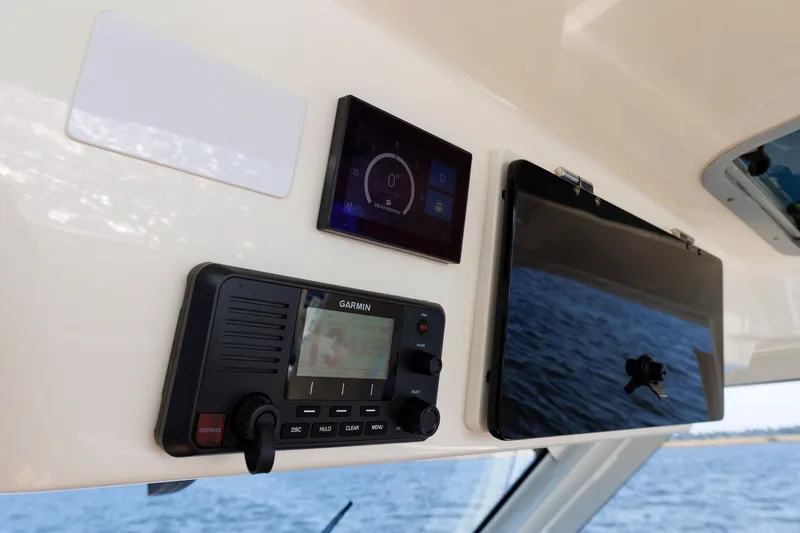 Slide: The Image of Control panel of a 2020 Boston Whaler 380 Realm with Garmin navigation system. - 55