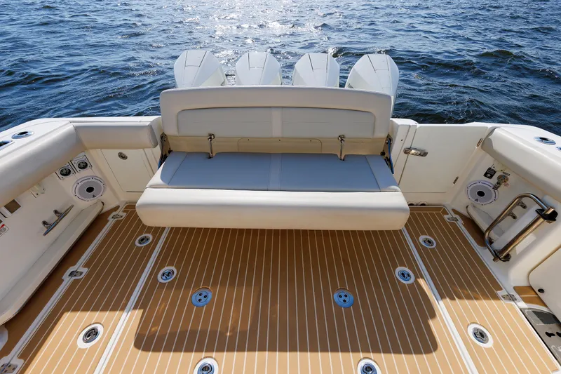Slide: The Image of Boston Whaler 380 Realm 2020 boat deck with seating, overlooking the ocean. - 34