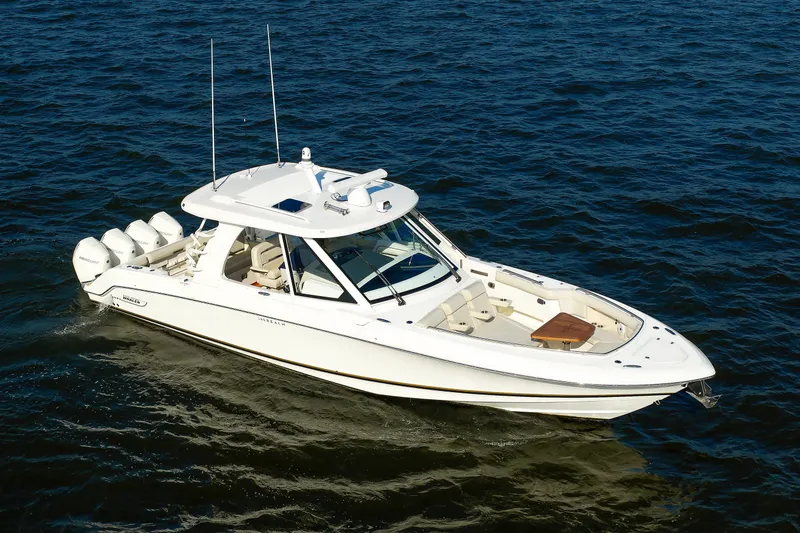 Slide: The Image of 2020 Boston Whaler 380 Realm boat cruising on open water. - 13
