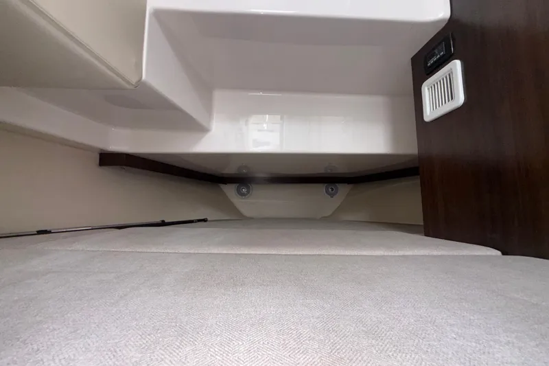 Slide: The Image of Interior cabin view of a 2019 Regal 33 SAV boat, featuring sleek design elements. - 27