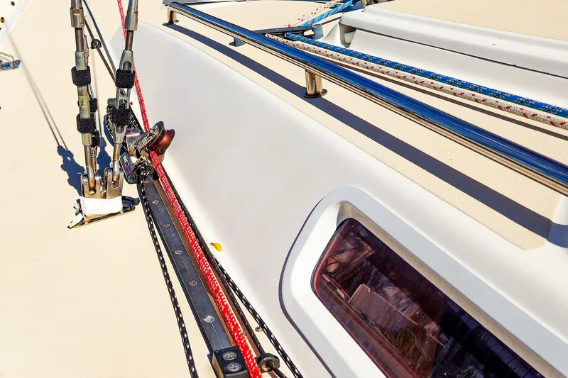 Slide: The Image of Deck view of 2005 J Boats J/100 sailboat, featuring rigging and ropes. - 6