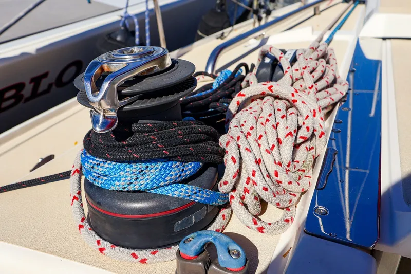 Slide: The Image of Close-up of sailing ropes and winch on a 2005 J Boats J/100 yacht deck. - 19