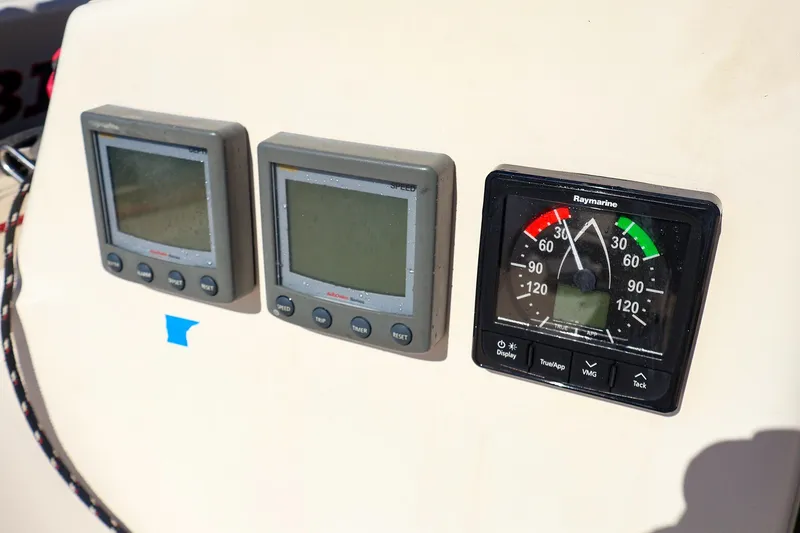 Slide: The Image of Close-up of 2005 J Boats J/100 navigation instruments, featuring Raymarine displays. - 20