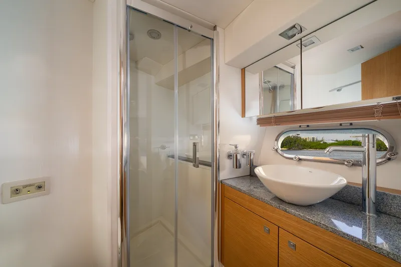 Slide: The Image of Luxurious bathroom on 2012 Sunseeker Manhattan 63 yacht with modern fixtures and shower. - 14