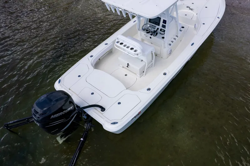 Slide: The Image of 2016 SeaVee 270Z boat with Mercury engine on calm water. - 15