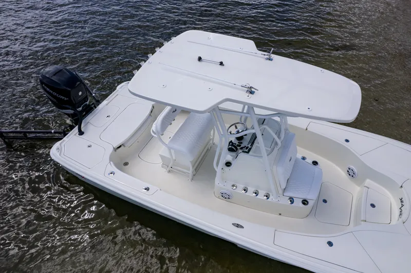 Slide: The Image of 2016 SeaVee 270Z boat with Mercury engine, docked on calm water. - 16