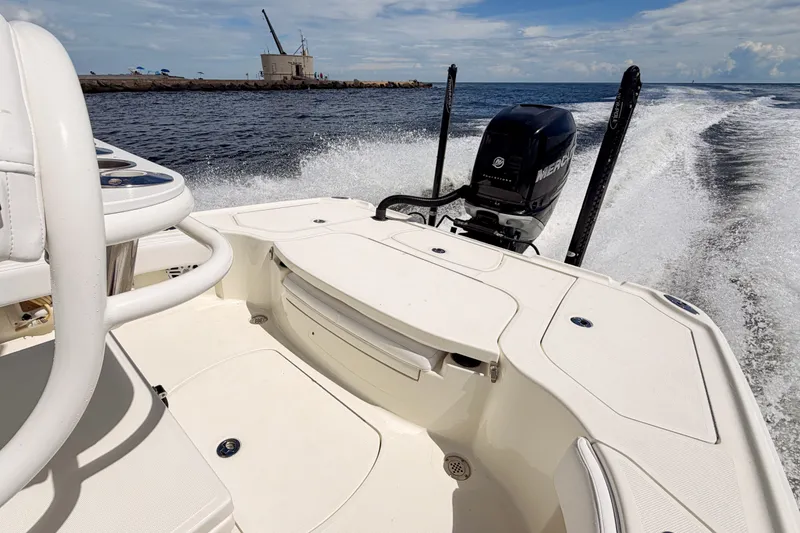 Slide: The Image of 2016 SeaVee 270Z boat cruising on water with Mercury outboard motor. - 38