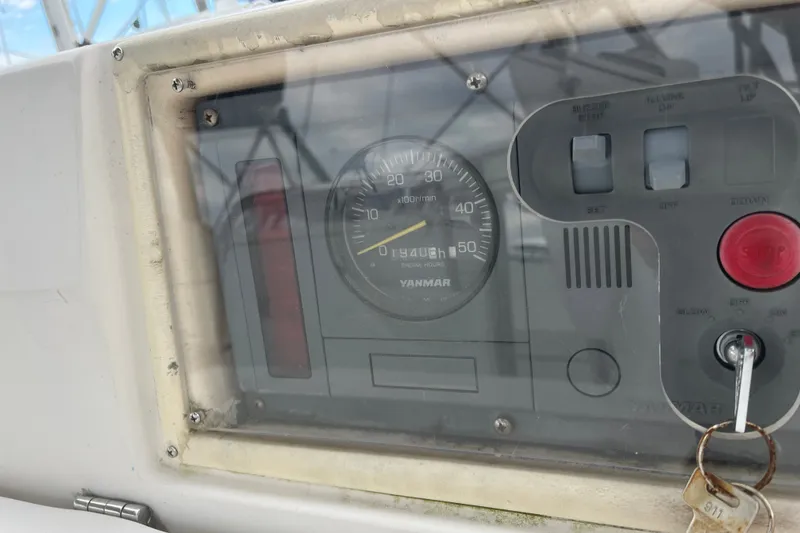 Slide: The Image of Control panel of a 2004 Hunter 36 sailboat with Yanmar engine display. - 17