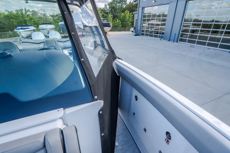 Slide: The Image of 2027 Monterey Elite 27 OB boat interior with sleek design and modern features. - 58