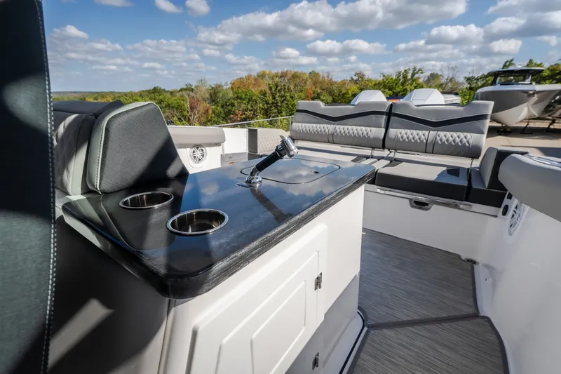 Slide: The Image of Luxurious interior of 2027 Monterey Elite 27 OB boat with sleek seating and modern amenities. - 30