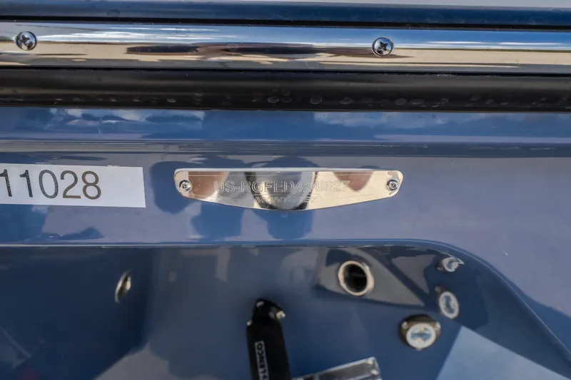 Slide: The Image of Close-up of a 2027 Monterey Elite 27 OB boat identification plate and serial number. - 74