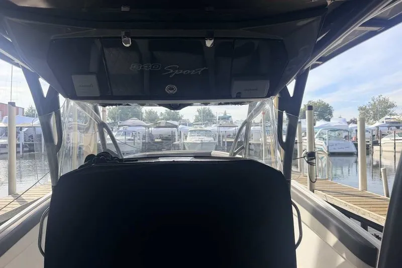 Slide: The Image of 2014 Nor-Tech 340 Sport boat docked at marina, view from cockpit. - 33