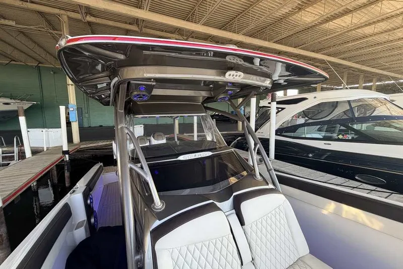 Slide: The Image of 2014 Nor-Tech 340 Sport boat interior with sleek design and modern features. - 24