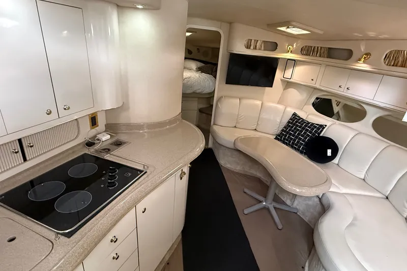 Slide: The Image of Luxurious interior of a 1997 Sea Ray Sundancer 400 yacht with modern amenities. - 32