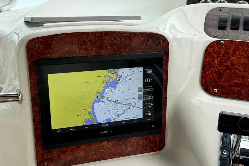 Slide: The Image of Garmin navigation display on 1997 Sea Ray Sundancer 400 yacht dashboard. - 22