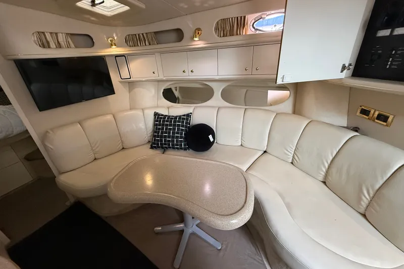 Slide: The Image of Interior of 1997 Sea Ray Sundancer 400 yacht with plush seating and modern amenities. - 40