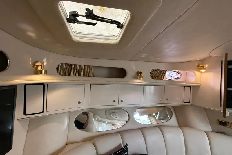 Slide: The Image of Interior of 1997 Sea Ray Sundancer 400 yacht with elegant cabinetry and lighting. - 41