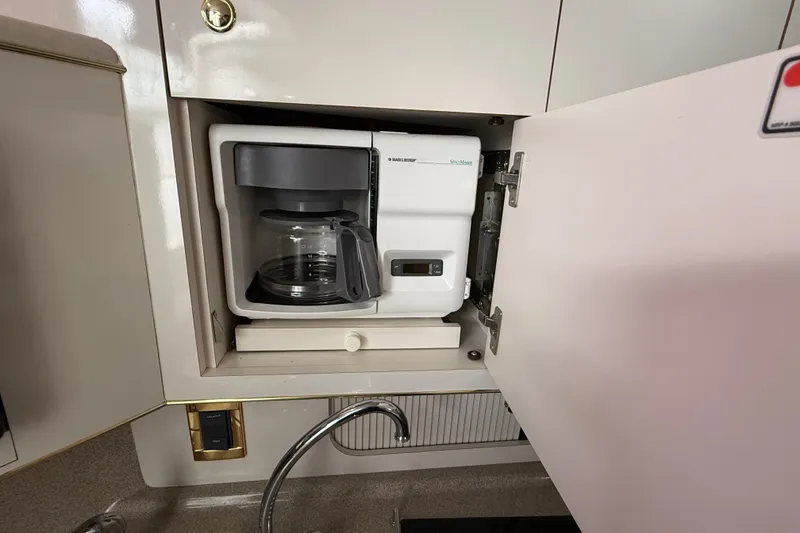 Slide: The Image of Built-in coffee maker in 1997 Sea Ray Sundancer 400 yacht kitchen cabinet. - 35