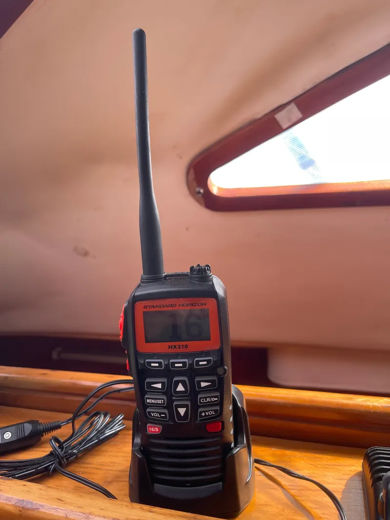 Slide: The Image of Radio on a yacht with wooden trim and a skylight. - 37