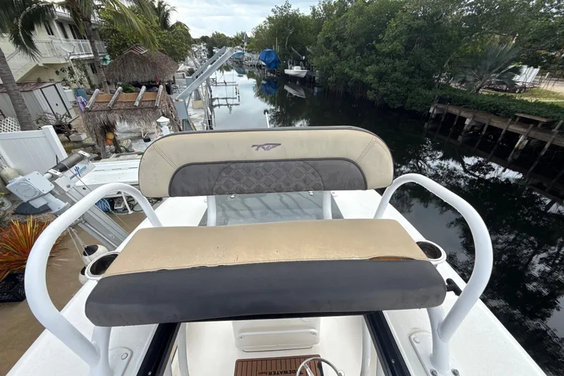 Slide: The Image of 2021 Tidewater 2500 Carolina Bay boat seat overlooking a serene canal. - 27