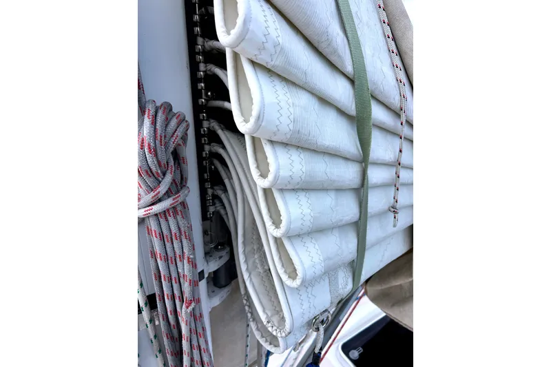 Slide: The Image of Rolled sail and ropes on a 2001 Sabre 402 yacht. - 36