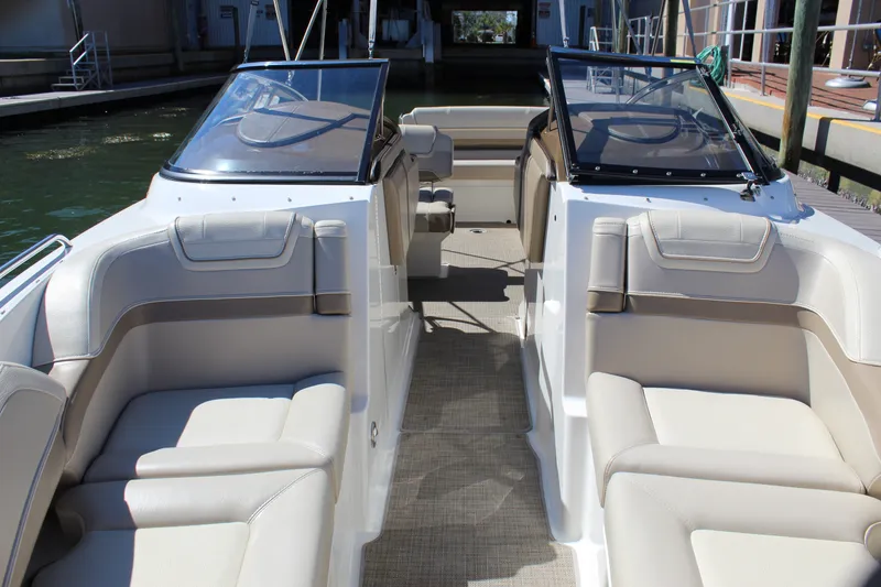 Slide: The Image of Interior view of a 2015 Formula 270 Bowrider boat with beige seating. - 40
