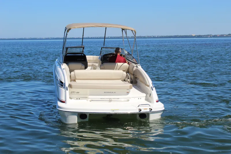 Slide: The Image of 2015 Formula 270 Bowrider cruising on a calm lake under clear blue skies. - 5