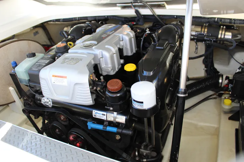 Slide: The Image of Engine compartment of a 2015 Formula 270 Bowrider, featuring a powerful V8 engine. - 46