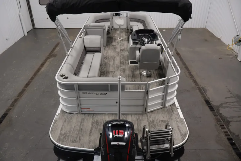 Slide: The Image of 2025 Ranger Reata 220C pontoon boat with Mercury 115 Pro XS engine, spacious seating. - 10