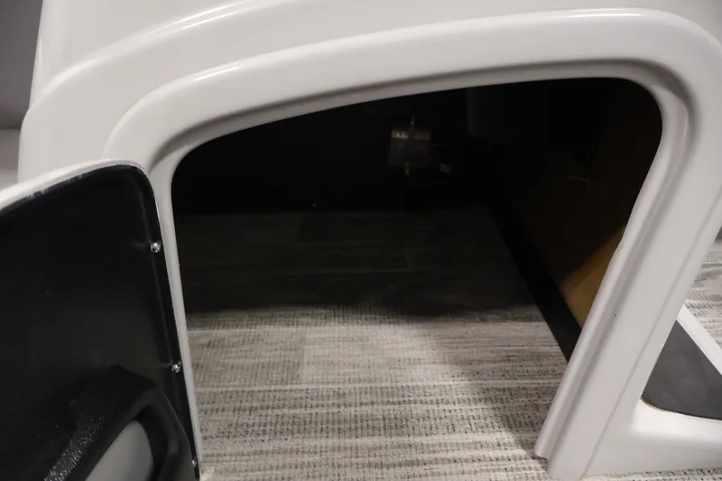 Slide: The Image of Storage compartment in 2025 Ranger Reata 220C boat, featuring sleek design and spacious interior. - 22